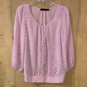 Limited blush colored blouse size XS.